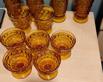 Vintage Indiana Glass Whitehall Amber footed set of 11.