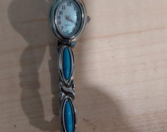 Vintage silver-toned women's watch with turquoise cabochons