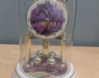 Thomas Kinkade vintage clock with rotating pendulum