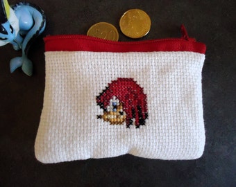 Knuckles cross stitched purse