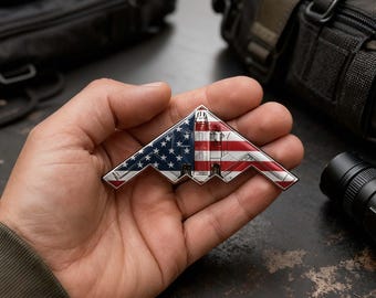 Moneta commemorativa "Spirit of '76" a forma di bombardiere stealth B-2, anniversario 1776-2026, da collezione per il 250° anniversario degli Stati Uniti.