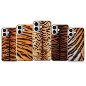 May include: Five rectangular smartphone cases arranged in a row, each featuring a distinct tiger stripe pattern in shades of orange, black, and white. Each case has a circular camera cutout in the upper left corner with two lens openings.