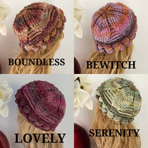 May include: Four crocheted hats in different colors and patterns. The hats are labeled "Boundless", "Bewitch", "Lovely", and "Serenity".