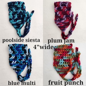 May include: Four crochet headscarves, each 4 inches wide, featuring variegated yarn patterns. The colors include shades of blue, purple, and multi-colored tones. Each scarf has attached ties and is labeled as poolside siesta, plum jam, blue multi, and fruit punch.