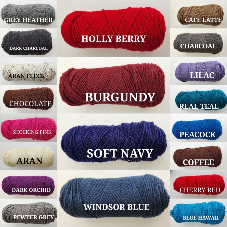 May include: A collection of yarn skeins in various colors, including grey heather, dark charcoal, aran fleck, chocolate, shocking pink, aran, dark orchid, pewter grey, holly berry, burgundy, soft navy, windsor blue, cafe latte, charcoal, lilac, real teal, peacock, coffee, cherry red, and blue hawaii.
