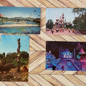 Vintage Disneyland Post Cards w/Sleeping Beauty Castle, Tomorrowland, Adventureland, & It’s a Small World.