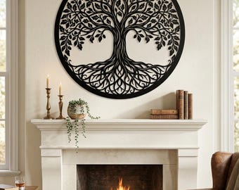 May include: A circular black metal wall art piece featuring a detailed tree of life design with intricate branches, leaves, and roots enclosed within a solid circular frame, mounted on a light-coloured wall above a fireplace mantel.