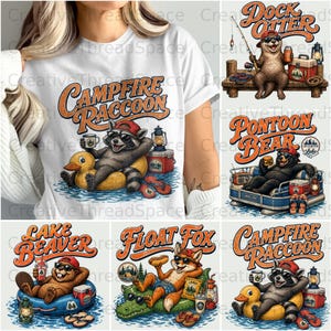 May include: A white t-shirt featuring a graphic of a raccoon wearing a red cap and sunglasses, floating on a yellow duck in water, with the text Campfire Raccoon. The design includes a lantern, a cooler, and sandals near the raccoon.