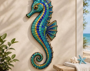 May include: A wall-mounted seahorse sculpture crafted from a mosaic of small, square tiles in shades of turquoise, deep blue, and gold. The seahorse features a curved tail, a prominent dorsal fin, and a circular eye, with a dark outline.