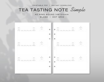 Könnte beinhalten: Zwei weiße A5-Ringbuchseiten mit einer Vorlage für Tee-Verkostungsnotizen. Der Text lautet TEA TASTING NOTE Simple, A5 RING BOUND 148*210mm, BLANK | DOT GRID. Jede Seite enthält drei Abschnitte mit Feldern für Name, Datum, Wetter, Marke, Ort, Preis, Teesorte und Präferenz.