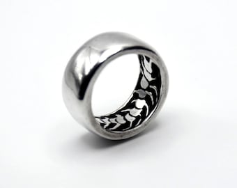 The Centipede Ring — Wide Silver Band with Hidden Creature Inside