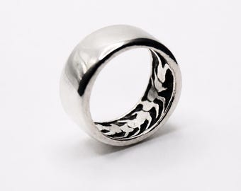 The Centipede Ring — Wide Silver Band with Hidden Creature Inside