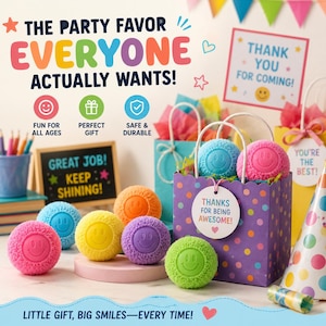 May include: A collection of colorful, textured, spherical balls featuring a smiley face design. The balls are pink, blue, yellow, orange, purple, and green. A purple polka-dot gift bag with a tag reading "THANKS FOR BEING AWESOME!" is included.