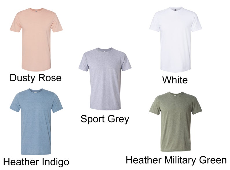 May include: Five different colored t-shirts, including dusty rose, white, sport grey, heather indigo, and heather military green.