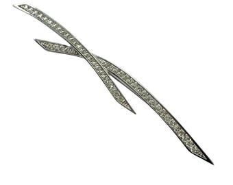 Broche Christian Dior, tono plata, cristales, chapado en rodio, estilo vintage de los años 80.