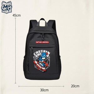 May include: A black backpack featuring a graphic of Captain America with a shield and the text "CAPTAIN AMERICA". The bag has a top handle, shoulder straps, and zippered compartments. Dimensions are 17.7 inches in height, 11.8 inches in width, and 7.9 inches in depth.