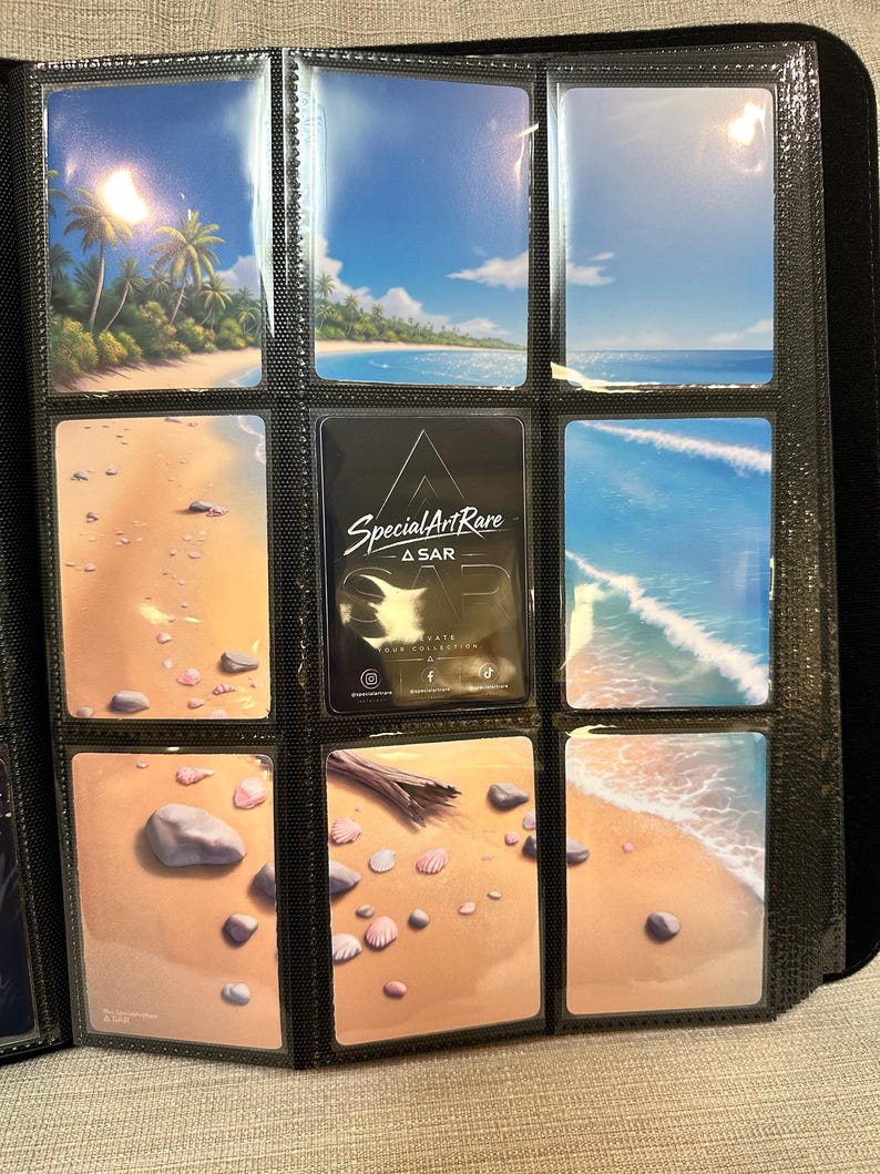 May include: A black binder with clear plastic pockets containing nine rectangular cards. Eight cards feature beach and ocean scenes with sand, shells, and blue water. One central black card displays the white text Special Art Rare A SAR.
