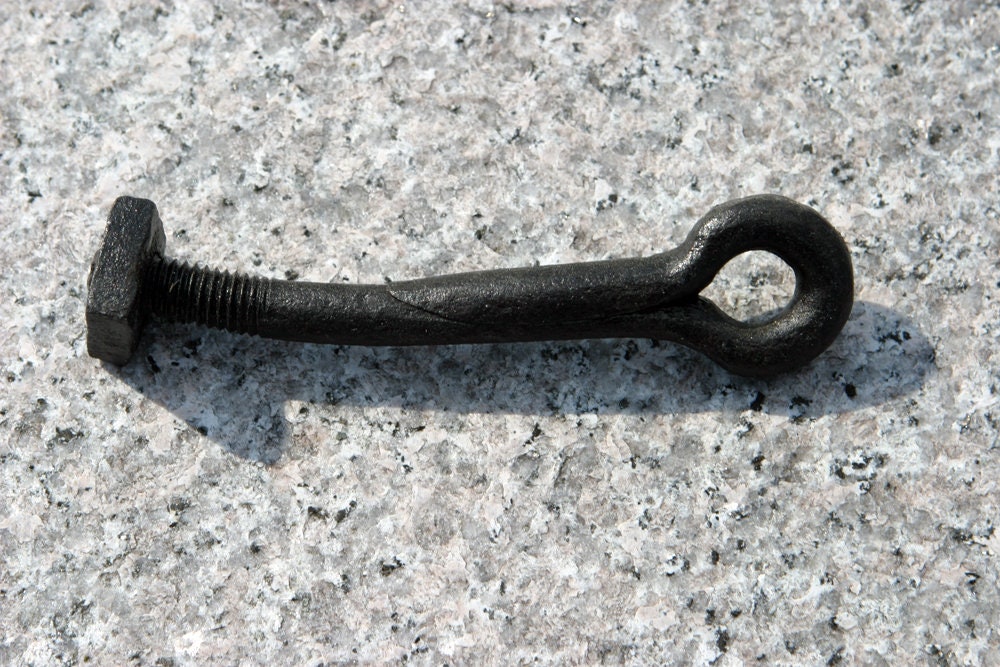 Closeup Of An Eye Bolt Sticking Straight Up From A Block Of, 48% OFF