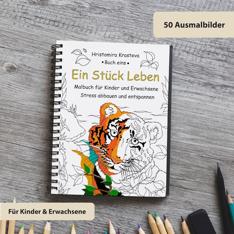 May include: A spiral-bound coloring book titled Ein St&uuml;ck Leben by Hristomira Krasteva, featuring a partially colored tiger illustration on the cover. The text includes Malbuch f&uuml;r Kinder und Erwachsene, Stress abbauen und entspannen, and 50 Ausmalbilder. Colored pencils are visible.