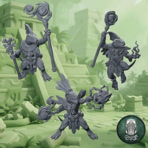 May include: Three grey lizard-like humanoid figurines in dynamic poses. Each figure wears feathered collars and loincloths. One holds a staff with a swirling top, another holds a staff with a sphere, and the third casts a spell with both hands.