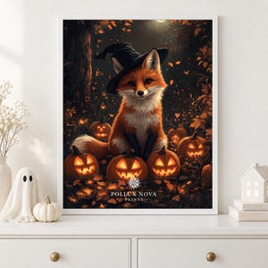 May include: A framed wall art print featuring a fox wearing a black witch hat, sitting in a dark forest surrounded by glowing jack-o'-lanterns and fallen autumn leaves. The text POLLUX NOVA PRINTS is printed in white at the bottom of the image.