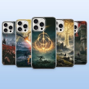 May include: Five smartphone cases featuring fantasy landscapes and glowing golden symbols. The designs include a field of red flowers, a fiery creature, a central glowing ring emblem, a radiant golden tree, and a dark stone castle structure.