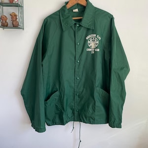 Vintage medium large green windbreaker jacket with flocked Elks graphic Muskegon Michigan