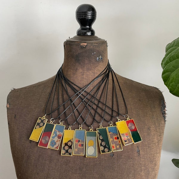 Handmade vintage quilt piece resin pendant necklace