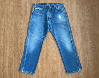 Vintage 34x29 wrangler jeans faded hole