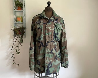 Vintage small long camo US military field jacket