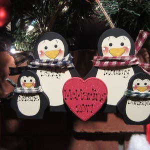 Famille de 4 personnes : décoration personnalisée de pingouin