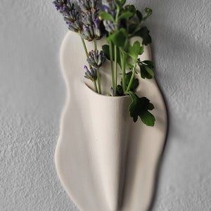 Handmade white matt ceramic wall sconce