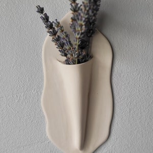 Handmade white matt ceramic wall sconce