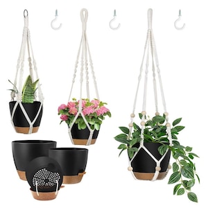 May include: Three off-white macrame plant hangers with knotted patterns and wooden beads, paired with black planters featuring cork-textured bases. The set includes three white metal ceiling hooks for suspension and internal drainage inserts.