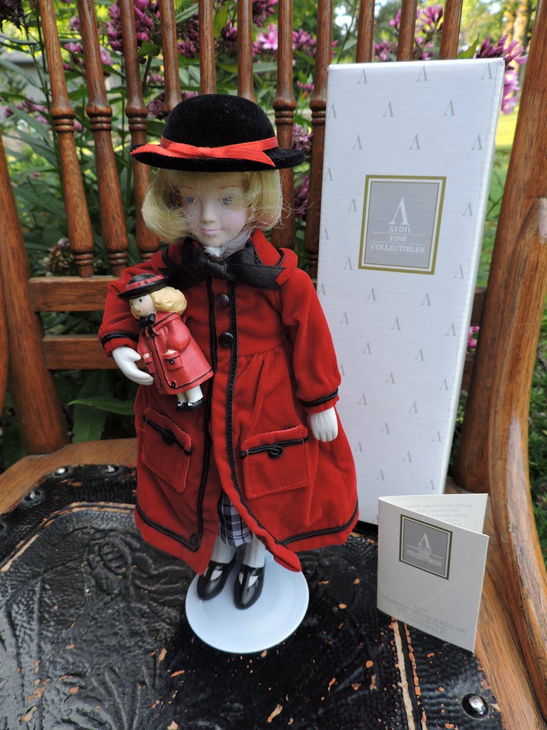 avon childhood dreams porcelain doll collection