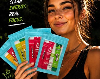 May include: Three light blue resealable pouches containing various single-serve drink mix packets. The packets are labeled Liftoff, Cherry, and Crush. Text on the image reads CLEAN ENERGY. REAL FOCUS. A white heart and crown icon are also visible.