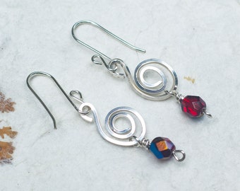 Sterling silver curl earrings with red Czech bead dangle