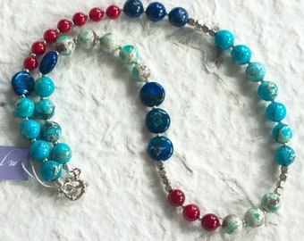 Red, blue, and silver bead necklace