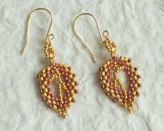 Red beaded leaf earrings