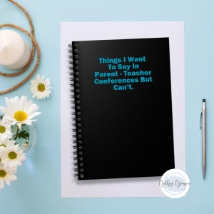 May include: A black spiral bound notebook with the text "Things I Want To Say In Parent-Teacher Conferences But Can't." in blue text on the front cover.