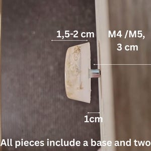 May include: A round, off-white cabinet knob with a metallic attachment. Text indicates a knob depth of 1.5-2 cm, a 1 cm panel thickness, and M4/M5 hardware components with a 3 cm length. The set includes a base and two hardware components.