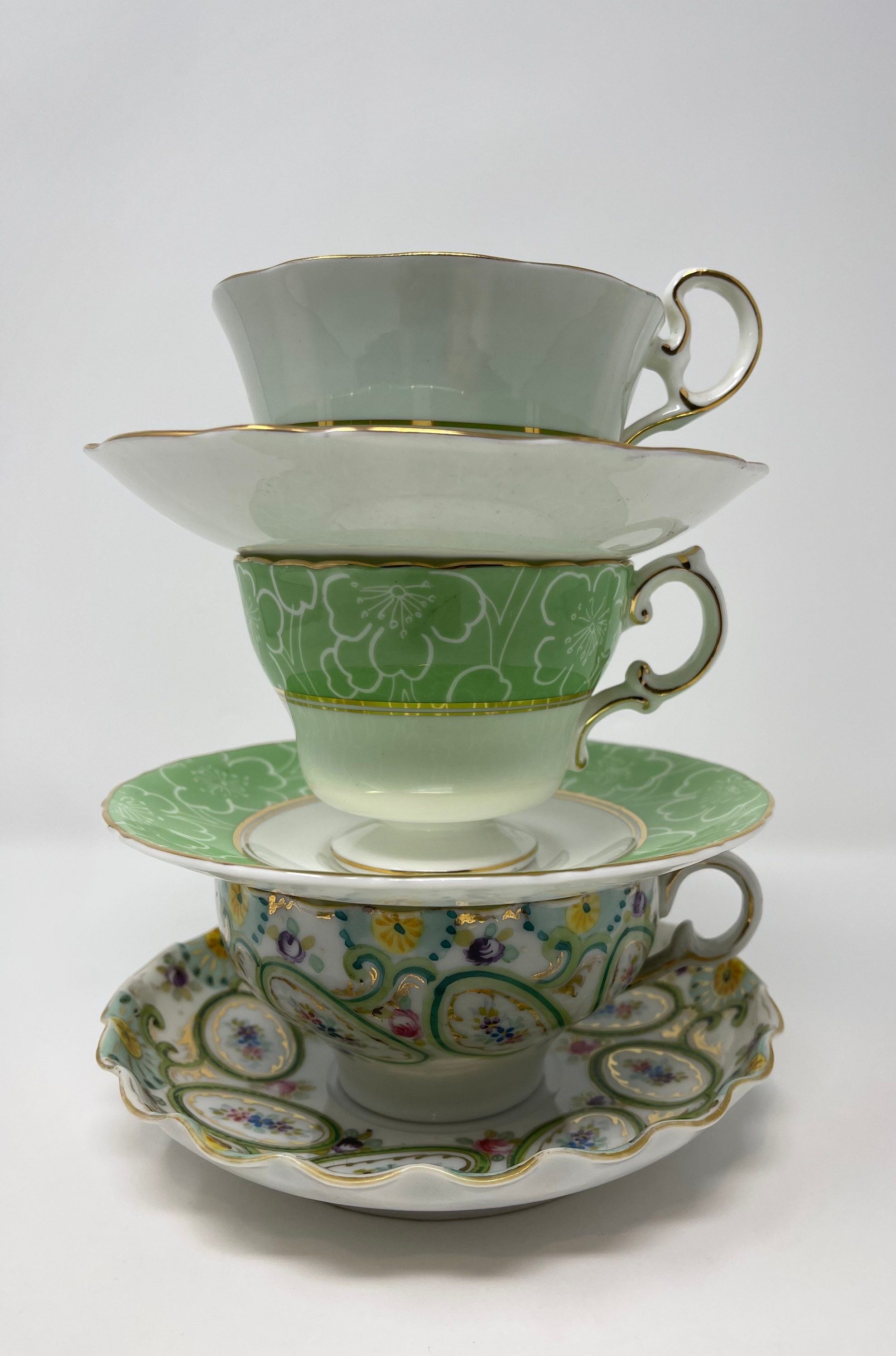 Vintage Tea Cup and Saucer,marking on bottom,green/gold,excellent