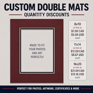 May include: A maroon double mat for framing with a white centre opening. The text reads CUSTOM DOUBLE MATS, QUANTITY DISCOUNTS, MADE TO FIT YOUR PHOTOS AND ART PERFECTLY, and lists sizes 8x10, 11x14, and 16x20 with corresponding prices in USD.