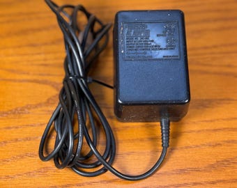 Nintendo SNES adapter SNS-002 tested working power supply 10v 850ma