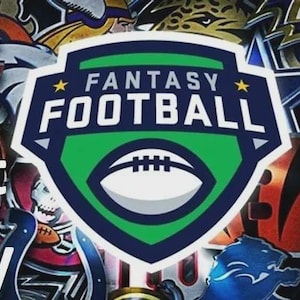 May include: A 2026 fantasy football live draft party graphic featuring a central shield logo with a football icon. The background displays a collage of various team logos. Text includes Live Draft Party, Auction Style, 12 Teams, and 22 Rounds.