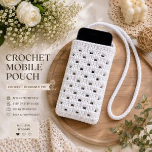 May include: A white crochet mobile pouch with a long matching strap, featuring a classic granny square pattern. The pouch holds a black smartphone and is presented as a beginner-friendly crochet project with a PDF guide, detailed photos, and instructions.