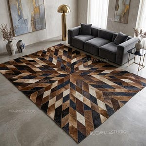 May include: A large rectangular area rug featuring a geometric pattern of interlocking diamonds in shades of brown, black, and cream. The rug is composed of stitched leather panels, creating a textured surface with a repeating starburst design.