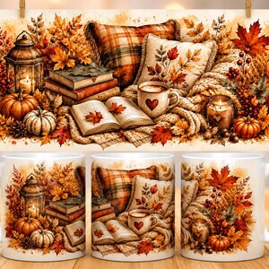 May include: A white ceramic mug featuring a printed autumn scene with orange and red maple leaves, pumpkins, a lit lantern, a stack of books, a cozy plaid pillow, and a mug with a heart design, all arranged in a warm, seasonal display.