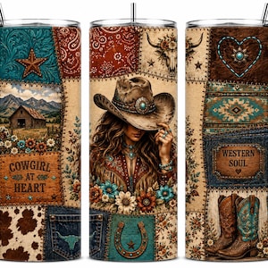 May include: A cylindrical tumbler with a straw featuring a patchwork design of cowhide, denim, and floral patterns. It displays a cowgirl in a hat, a barn, a horseshoe, cowboy boots, and the text "COWGIRL AT HEART" and "WESTERN SOUL" in brown.