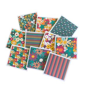 May include: Assortment of ten 4x4 inch patterned paper cards with floral and geometric designs in shades of green, red, yellow, and white.